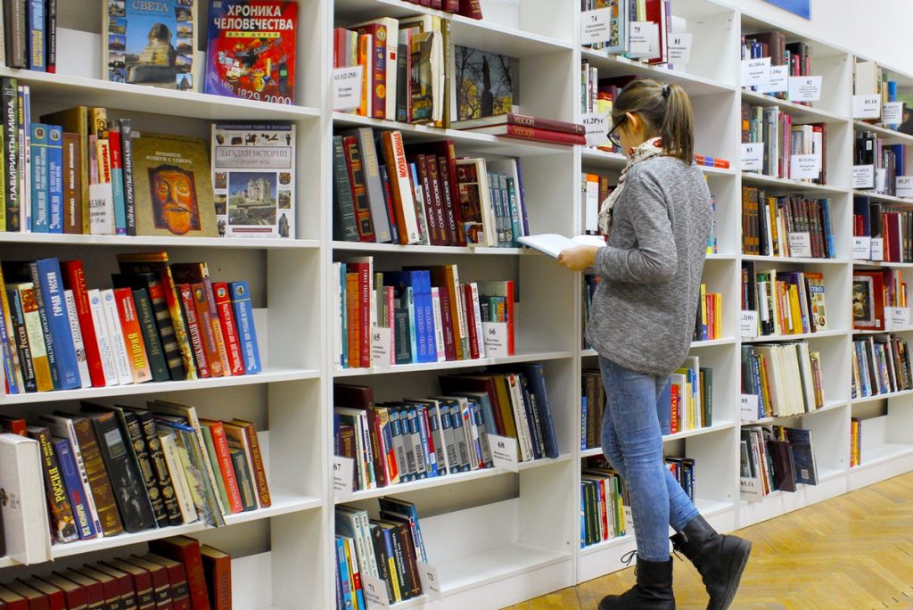 A student reading in a library